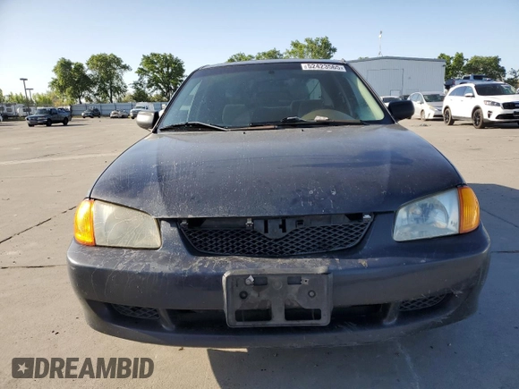 1999 Mazda Protege DX z VIN JM1BJ2227X0106522, wystawiony jako Copart lot #52423565 z przebiegiem 206 260 mil mil oraz Szkoda całkowita • Salvage title. Historia ofert i sprzedaży dostępna na DreamBid. Obrazek 5.