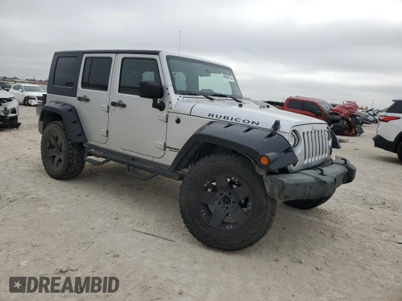 2009 Jeep Wrangler Unlimited Rubicon with VIN 1J8GA69169L731787, listed as a Copart auction lot 44604125 with 180,861 mi miles and Salvage title. Bid and sale history available at DreamBid. Image 4.
