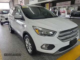 2018 Ford Escape SE z VIN 1FMCU9GD3JUC89119, wystawiony jako IAAI lot #42421139 z przebiegiem 42 209 mil mil oraz . Historia ofert i sprzedaży dostępna na DreamBid. Obrazek 3.