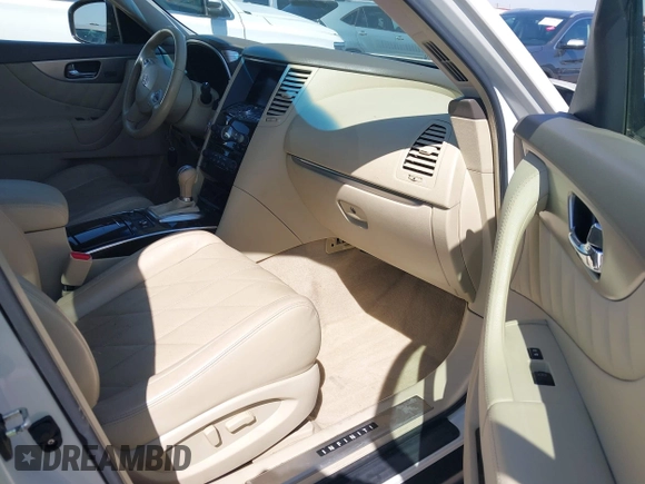 2011 Infiniti FX z VIN JN8AS1MW8BM734422, wystawiony jako IAAI lot #41896612 z przebiegiem 153 404 mil mil oraz . Historia ofert i sprzedaży dostępna na DreamBid. Obrazek 5.