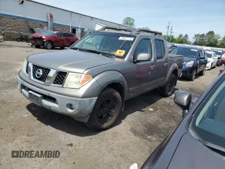 2005 Nissan Frontier LE z VIN 1N6AD07W45C402772, wystawiony jako Copart lot #58621115 z przebiegiem 159 325 mil mil oraz Czysty tytuł • Clean title. Historia ofert i sprzedaży dostępna na DreamBid. Obrazek 1.