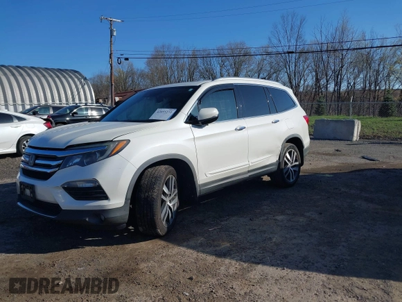 2016 Honda Pilot Touring with VIN 5FNYF6H98GB017079, listed as a IAAI auction lot 42055272 with 142,726 mi miles and . Bid and sale history available at DreamBid. Image 18.