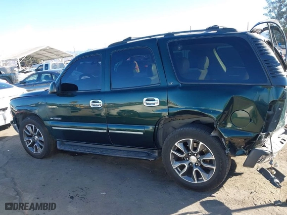 2002 Chevrolet Tahoe LS with VIN 1GNEC13T12R134174, listed as a IAAI auction lot 41233999 with 235,892 mi miles. Bid and sale history available at carsss.com. Image 14.