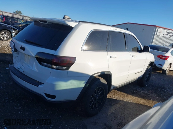 2017 Jeep Grand Cherokee Laredo with VIN 1C4RJEAG1HC903264, listed as a IAAI auction lot 40606675 with 144,106 mi miles. Bid and sale history available at carsss.com. Image 4.
