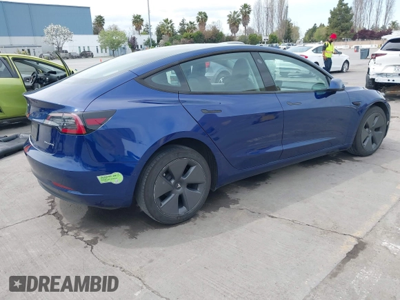 2021 Tesla Model 3 Long Range with VIN 5YJ3E1EB6MF878411, listed as a IAAI auction lot 41986947 with 71,978 mi miles and . Bid and sale history available at DreamBid. Image 4.