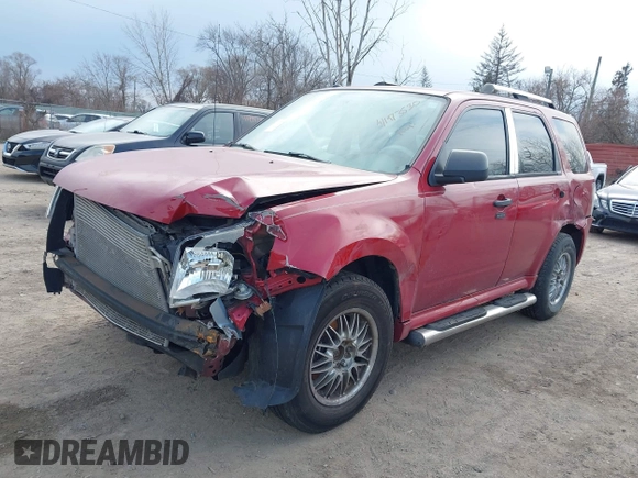 2011 Mercury Mariner z VIN 4M2CN8B76BKJ04064, wystawiony jako IAAI lot #41973530 z przebiegiem 137 753 mil mil oraz . Historia ofert i sprzedaży dostępna na DreamBid. Obrazek 2.