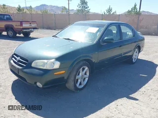 2000 Nissan Maxima GXE z VIN JN1CA31A8YT007617, wystawiony jako IAAI lot #42479039 z przebiegiem 165 950 mil mil oraz . Historia ofert i sprzedaży dostępna na DreamBid. Obrazek 2.