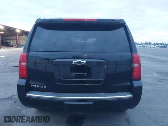 2015 Chevrolet Tahoe LTZ z VIN 1GNSKCKC5FR213209, wystawiony jako IAAI lot #41023368 z przebiegiem Nie podano mil oraz . Historia ofert i sprzedaży dostępna na DreamBid. Obrazek 15.