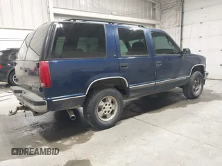 1999 Chevrolet Tahoe Z71 z VIN 1GNEK13R8XJ523049, wystawiony jako IAAI lot #41992101 z przebiegiem 180 169 mil mil oraz . Historia ofert i sprzedaży dostępna na DreamBid. Obrazek 4.