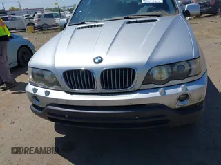2001 BMW X5 4.4i with VIN WBAFB33511LH18797, listed as a IAAI auction lot 42075328 with 169,396 mi miles. Bid and sale history available at carsss.com. Image 6.