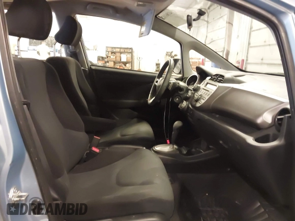 2009 Honda Fit Sport with VIN JHMGE88489S005033, listed as a IAAI auction lot 41861124 with 56,148 mi miles and . Bid and sale history available at DreamBid. Image 5.