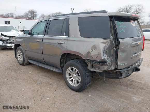 2017 Chevrolet Tahoe LT with VIN 1GNSCBKC0HR228016, listed as a IAAI auction lot 41232841 with 105,385 mi miles. Bid and sale history available at carsss.com. Image 3.