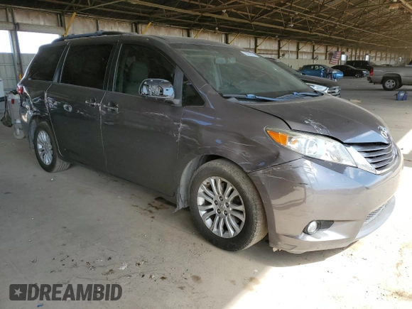 2016 Toyota Sienna XLE with VIN 5TDYK3DC5GS745451, listed as a Copart auction lot 63852525 with 161,578 mi miles and Salvage title. Bid and sale history available at DreamBid. Image 4.