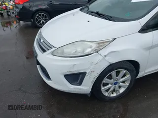2012 Ford Fiesta SE with VIN 3FADP4BJ8CM102695, listed as a IAAI auction lot 41734833 with 131,779 mi miles. Bid and sale history available at carsss.com. Image 6.