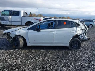 2018 Subaru Impreza with VIN 4S3GTAA62J3742382, listed as a IAAI auction lot 40836283 with 69,574 mi miles. Bid and sale history available at carsss.com. Image 13.