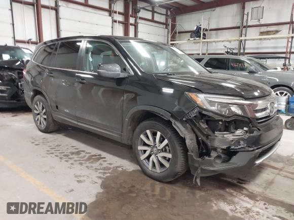 2019 Honda Pilot EX-L with VIN 5FNYF6H5XKB067858, listed as a IAAI auction lot 41643807 with 102,114 mi miles and . Bid and sale history available at carsss.com. Image 1.
