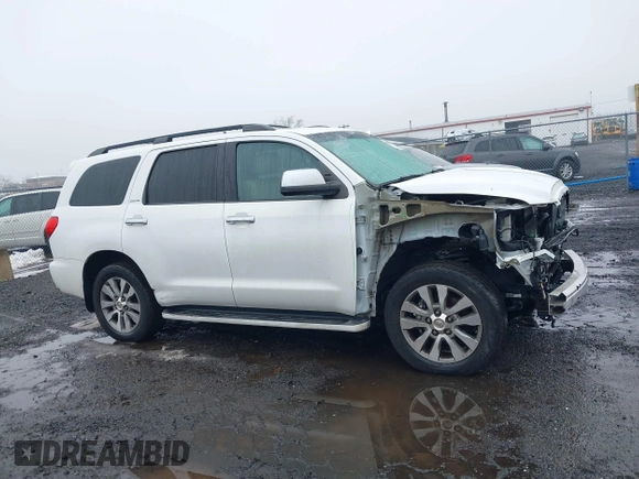 2016 Toyota Sequoia Limited with VIN 5TDJY5G18GS140071, listed as a IAAI auction lot 41570590 with 76,774 mi miles. Bid and sale history available at carsss.com. Image 13.