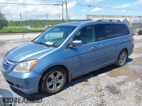 2010 Honda Odyssey Touring with VIN 5FNRL3H93AB058240, listed as a IAAI auction lot 42211192 with 223,859 mi miles and . Bid and sale history available at DreamBid. Image 2.