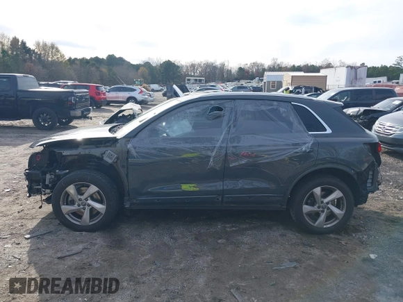 2019 Audi Q3 Premium with VIN WA1AECF37K1076492, listed as a IAAI auction lot 41099499 with 80,975 mi miles and . Bid and sale history available at DreamBid. Image 14.
