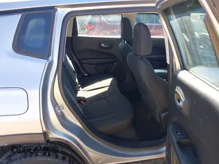 2018 Jeep Compass Sport with VIN 3C4NJDAB8JT191603, listed as a IAAI auction lot 41674308 with 107,291 mi miles and . Bid and sale history available at DreamBid. Image 8.