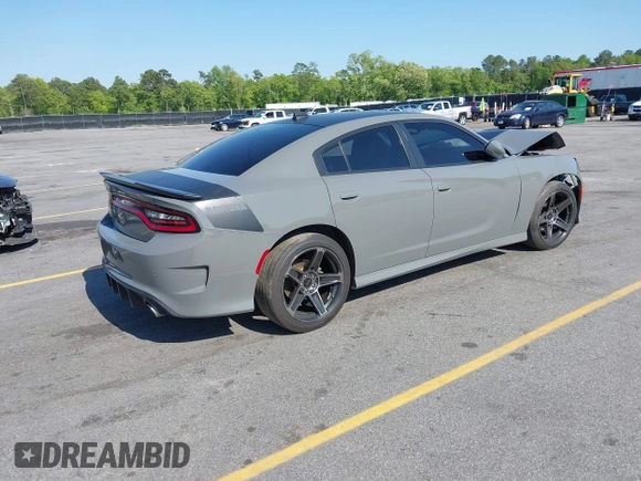 2017 Dodge Charger R/T with VIN 2C3CDXCT6HH595433, listed as a IAAI auction lot 42034429 with 123,512 mi miles and . Bid and sale history available at DreamBid. Image 4.