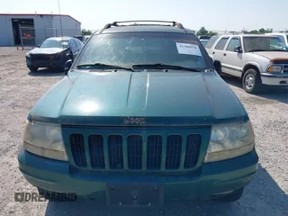 1999 Jeep Grand Cherokee Limited z VIN 1J4GW68N5XC630910, wystawiony jako IAAI lot #42380978 z przebiegiem 188 300 mil mil oraz . Historia ofert i sprzedaży dostępna na DreamBid. Obrazek 6.