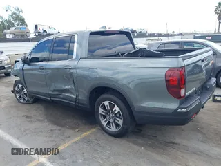 2017 Honda Ridgeline RTL-T with VIN 5FPYK2F63HB001488, listed as a IAAI auction lot 40078694 with Not provided miles and . Bid and sale history available at DreamBid. Image 3.