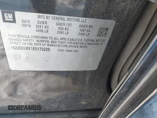 2014 Cadillac ATS Standard AWD with VIN 1G6AG5RX1E0170228, listed as a IAAI auction lot 41629063 with 89,568 mi miles and . Bid and sale history available at DreamBid. Image 9.