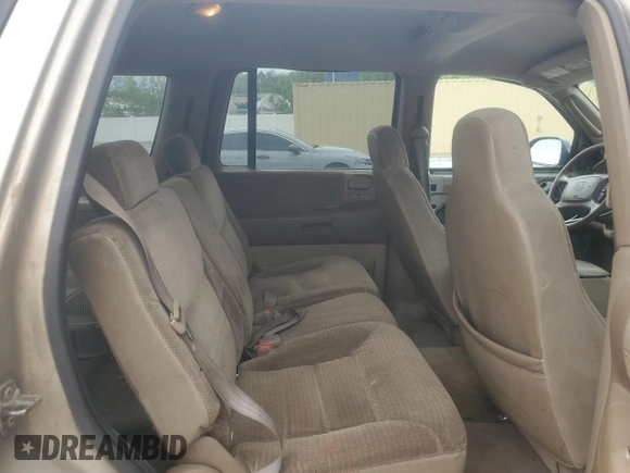 2003 Dodge Durango SLT z VIN 1D4HS48N63F523970, wystawiony jako Copart lot #57568385 z przebiegiem 296 806 mil mil oraz Czysty tytuł • Clean title. Historia ofert i sprzedaży dostępna na DreamBid. Obrazek 11.