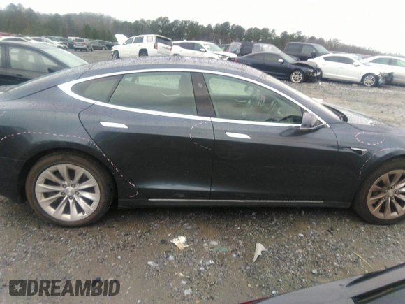 2016 Tesla Model S 70 with VIN 5YJSA1E13GF174542, listed as a IAAI auction lot 41169279 with 72,691 mi miles and . Bid and sale history available at DreamBid. Image 13.
