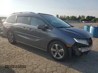 2018 Honda Odyssey Touring с VIN 5FNRL6H83JB009998, выставлен на аукционе Copart как лот 60616695 с пробегом 101 880 миль миль и Списание • Salvage title. История ставок и продаж доступна на DreamBid. Изображение 4.