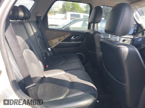 2006 Mercury Mariner Luxury with VIN 4M2YU56106KJ11501, listed as a IAAI auction lot 42634351 with 141,456 mi miles and . Bid and sale history available at DreamBid. Image 8.