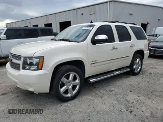 2013 Chevrolet Tahoe LTZ z VIN 1GNSCCE04DR210572, wystawiony jako Copart lot #42819375 z przebiegiem 219 387 mil mil oraz Szkoda całkowita • Salvage title. Historia ofert i sprzedaży dostępna na DreamBid. Obrazek 1.