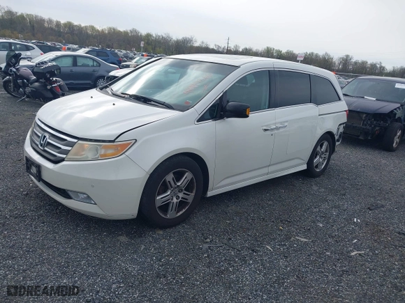 2012 Honda Odyssey Touring with VIN 5FNRL5H91CB119499, listed as a IAAI auction lot 41997265 with 284,353 mi miles. Bid and sale history available at carsss.com. Image 17.