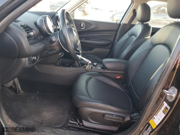 2019 MINI Cooper Clubman with VIN WMWLN5C56K2E35048, listed as a Copart auction lot 73778124 with 82,812 mi miles and Clean Title. Bid and sale history available at carsss.com. Image 7.