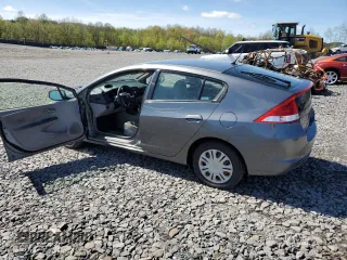 2010 Honda Insight LX z VIN JHMZE2H59AS000085, wystawiony jako Copart lot #54932975 z przebiegiem 218 961 mil mil oraz Szkoda całkowita • Salvage title. Historia ofert i sprzedaży dostępna na DreamBid. Obrazek 2.