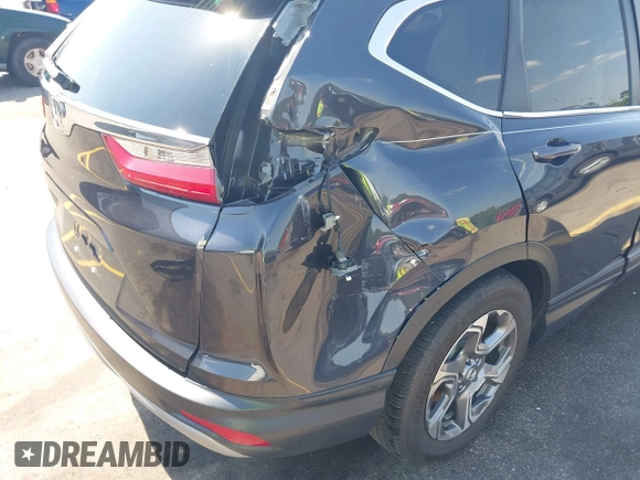 2019 Honda CR-V EX with VIN 2HKRW1H52KH513252, listed as a IAAI auction lot 42074091 with 31,764 mi miles and . Bid and sale history available at DreamBid. Image 18.