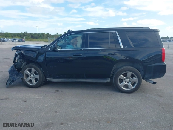 2016 Chevrolet Tahoe LS with VIN 1GNSCAKC1GR455823, listed as a IAAI auction lot 40869580 with 171,029 mi miles. Bid and sale history available at carsss.com. Image 14.