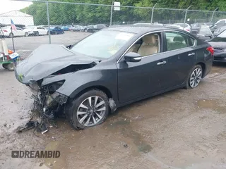 2016 Nissan Altima SR with VIN 1N4AL3AP0GC284799, listed as a IAAI auction lot 42476891 with 158,321 mi miles and . Bid and sale history available at DreamBid. Image 17.