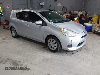 2012 Toyota Prius One z VIN JTDKDTB3XC1503779, wystawiony jako IAAI lot #42544431 z przebiegiem 174 304 mil mil oraz . Historia ofert i sprzedaży dostępna na DreamBid. Obrazek 1.