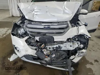 2019 Ford Escape Titanium z VIN 1FMCU9J97KUA85865, wystawiony jako Copart lot #56643135 z przebiegiem Nie podano mil oraz Szkoda całkowita • Salvage title. Historia ofert i sprzedaży dostępna na DreamBid. Obrazek 12.