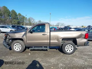 2015 Chevrolet Silverado 1500 Work Truck with VIN 1GCNCPEH7FZ233253, listed as a IAAI auction lot 41544405 with 139,708 mi miles and . Bid and sale history available at DreamBid. Image 14.