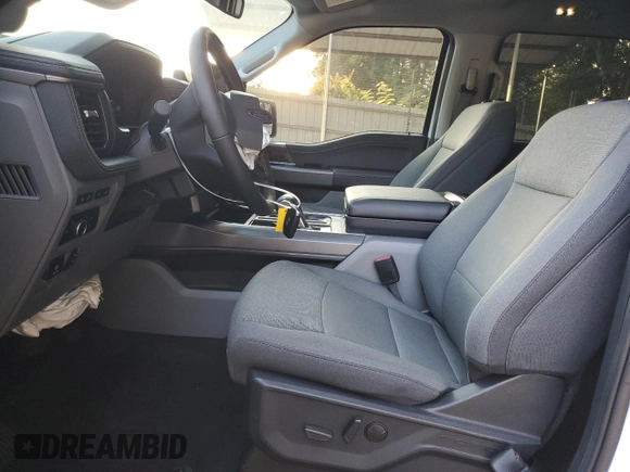 2024 Ford F-150 Lightning Flash с VIN 1FT6W3L7XRWG07097, выставлен на аукционе Copart как лот 76047344 с пробегом 2 172 миль миль и Списание • Salvage title. История ставок и продаж доступна на DreamBid. Изображение 7.