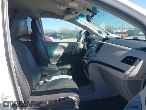 2014 Toyota Sienna SE with VIN 5TDXK3DC0ES477207, listed as a IAAI auction lot 41624619 with 213,881 mi miles and . Bid and sale history available at DreamBid. Image 5.