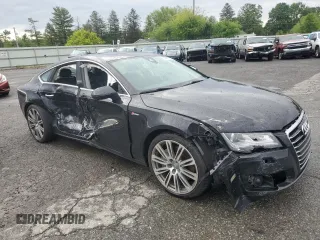 2014 Audi A7 Premium Plus with VIN WAUWGAFC4EN156501, listed as a Copart auction lot 58092255 with Not provided miles and Salvage title. Bid and sale history available at DreamBid. Image 4.