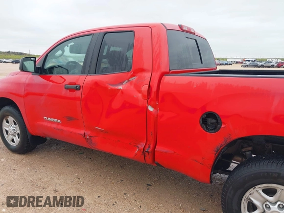 2012 Toyota Tundra z VIN 5TFUM5F11CX028307, wystawiony jako IAAI lot #41952532 z przebiegiem 253 254 mil mil oraz . Historia ofert i sprzedaży dostępna na DreamBid. Obrazek 17.