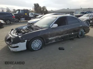 1998 Acura Integra LS with VIN JH4DB7655WS006377, listed as a Copart auction lot 42187355 with 165,638 mi miles and Salvage title. Bid and sale history available at DreamBid. Image 1.