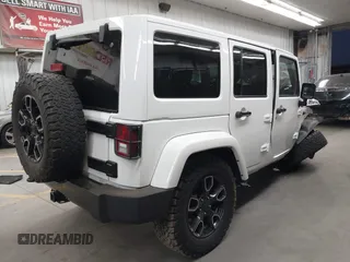 2017 Jeep Wrangler Unlimited Sahara with VIN 1C4BJWEG2HL700840, listed as a IAAI auction lot 42631036 with 60,610 mi miles and . Bid and sale history available at DreamBid. Image 4.