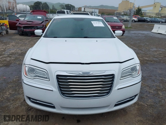 2014 Chrysler 300 with VIN 2C3CCAAG2EH235495, listed as a IAAI auction lot 41787801 with 142,354 mi miles and . Bid and sale history available at DreamBid. Image 12.