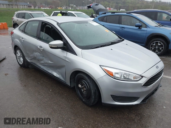 2017 Ford Focus SE with VIN 1FADP3F24HL303600, listed as a IAAI auction lot 41948159 with 95,212 mi miles and . Bid and sale history available at DreamBid. Image 1.